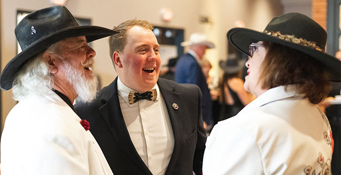 Members chatting at event